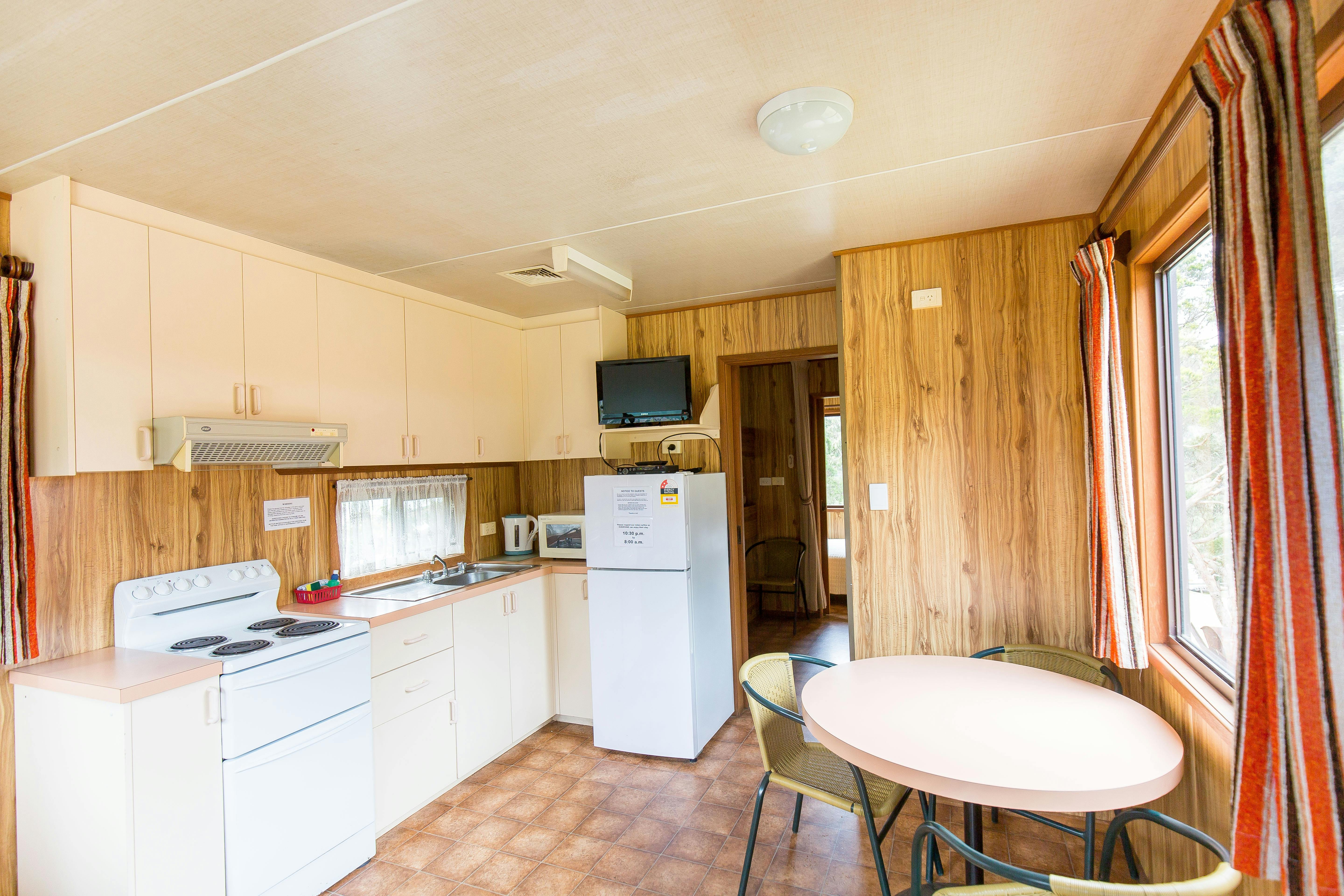 This is the kitchen and dining area of one of our Cottages.
