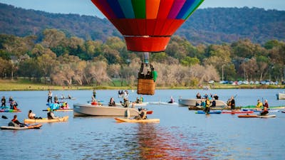Balloon from Canberra Balloon Spectacular hovering over the water