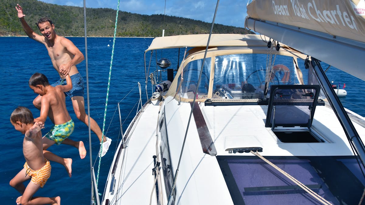 Jumping off the Boat for a swim makes your Yacht Charter holiday a world of fun