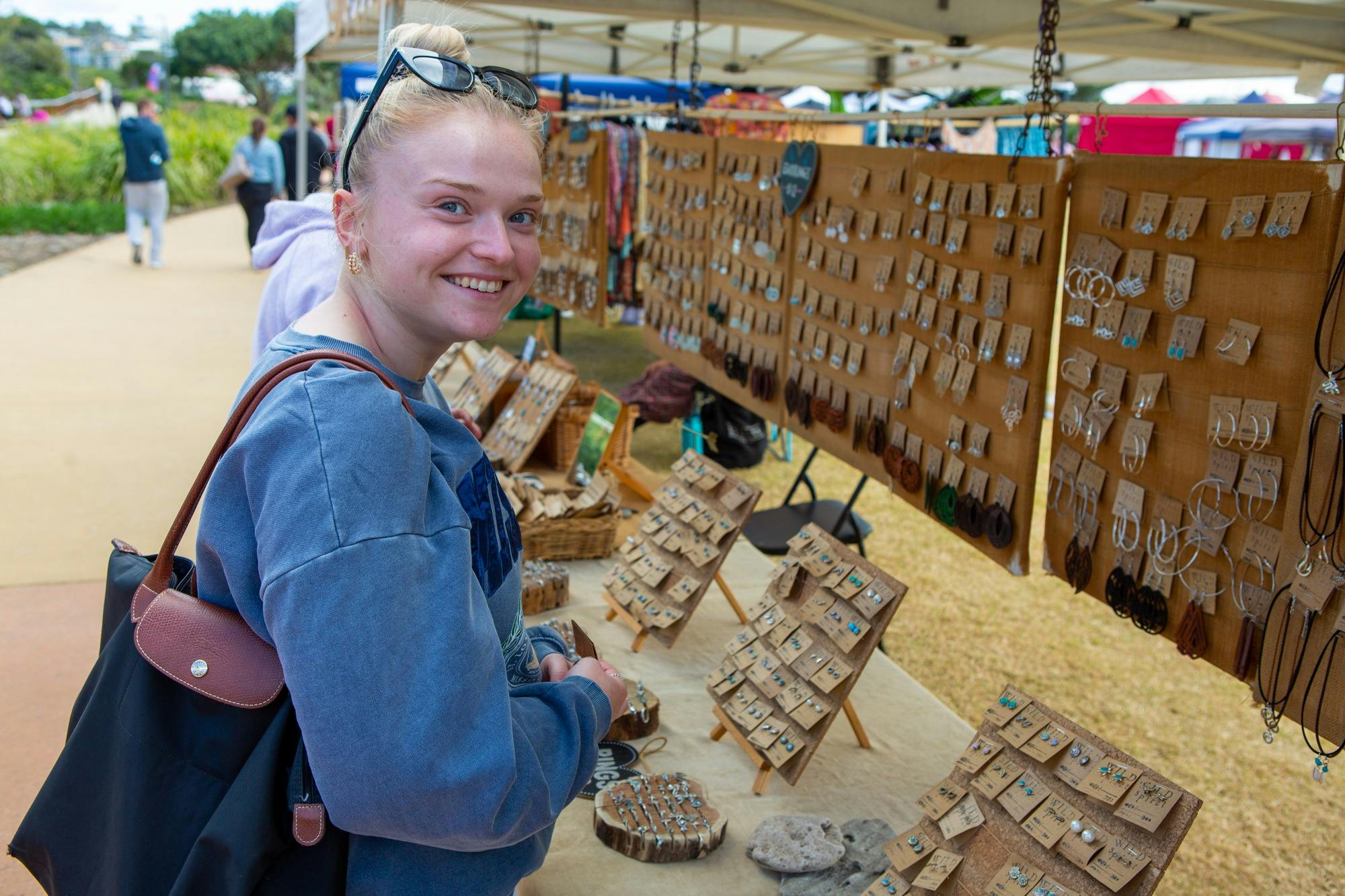 Visitor shopping at a  jewellery stall
