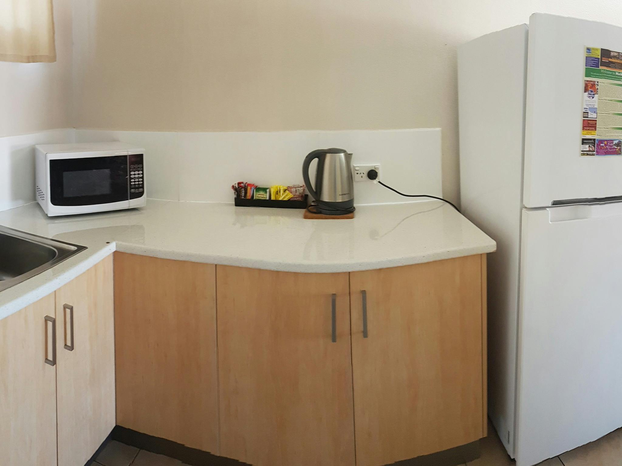 Self-Contained King Room Kitchen Self-Contained King Room Kitchen