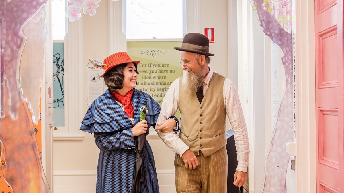 Costumed interpreters strolling through Cherry Tree Lane