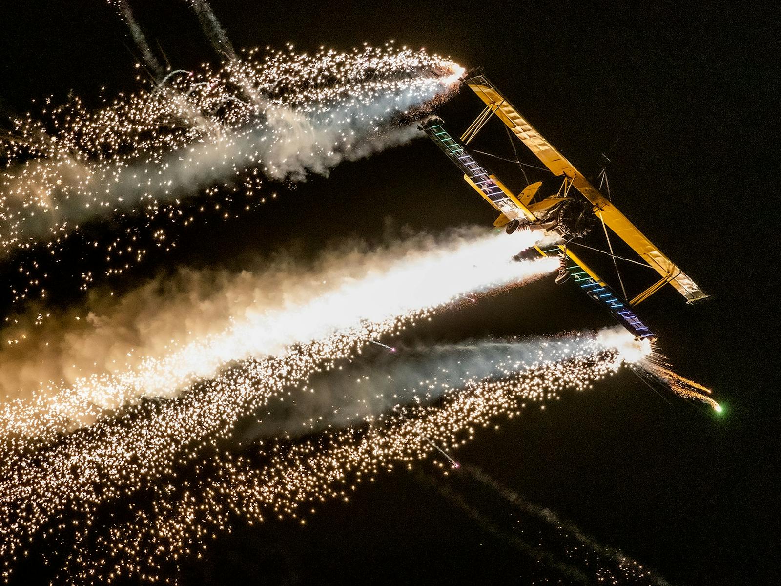 Scandinavian Airshows wowing with their Night Aerobatics with fireworks and laser show!