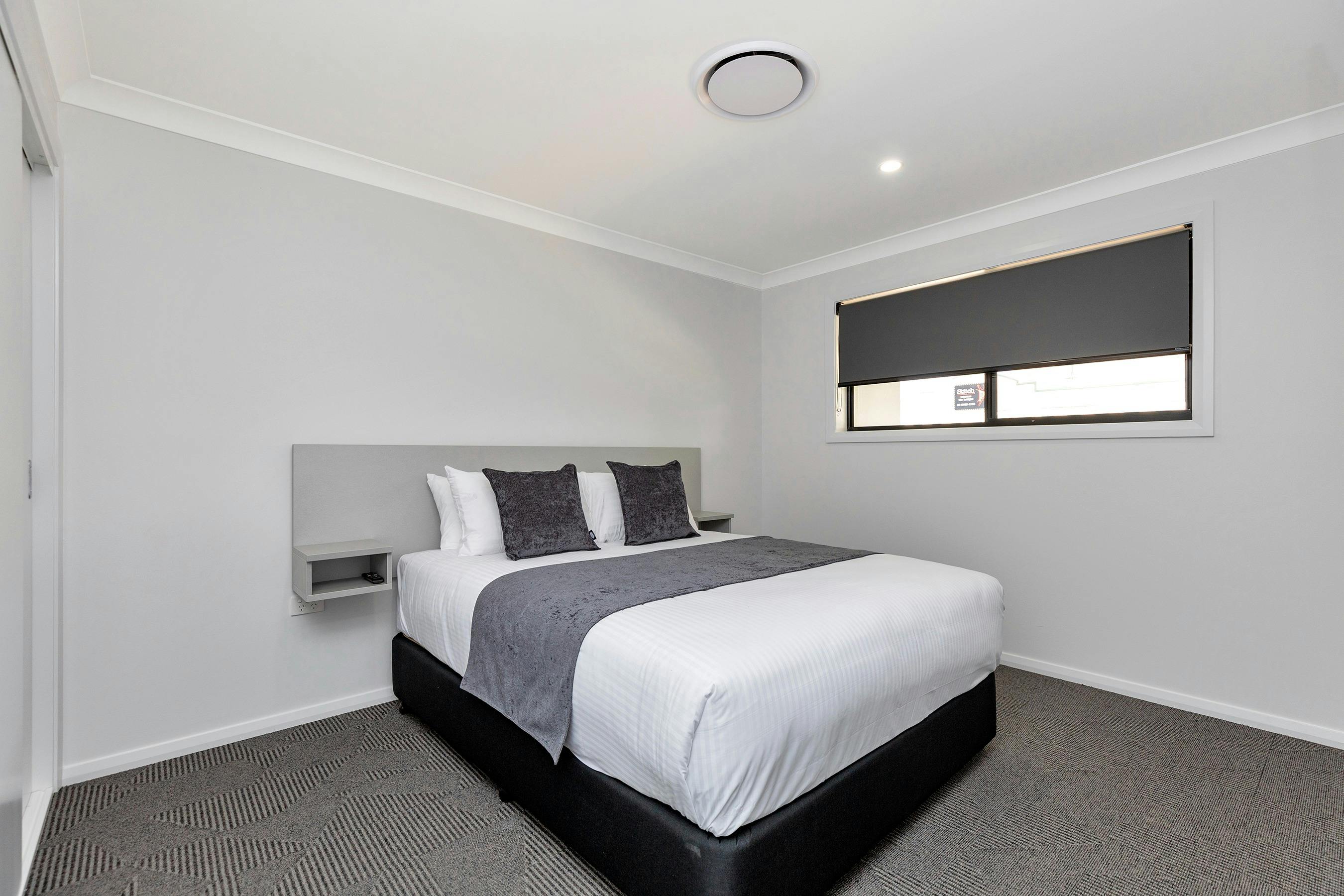Bedroom with king size bed, built-in wardrobe, USB charging points and smart-TV