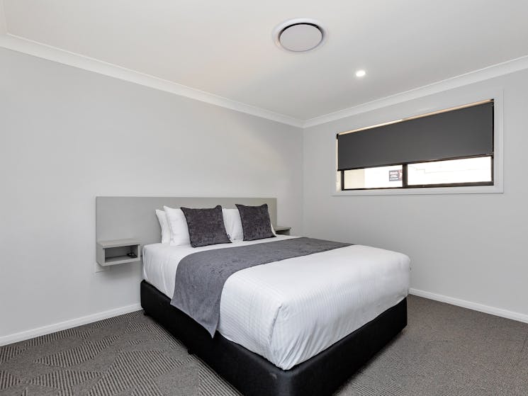 Bedroom with king size bed, built-in wardrobe, USB charging points and smart-TV