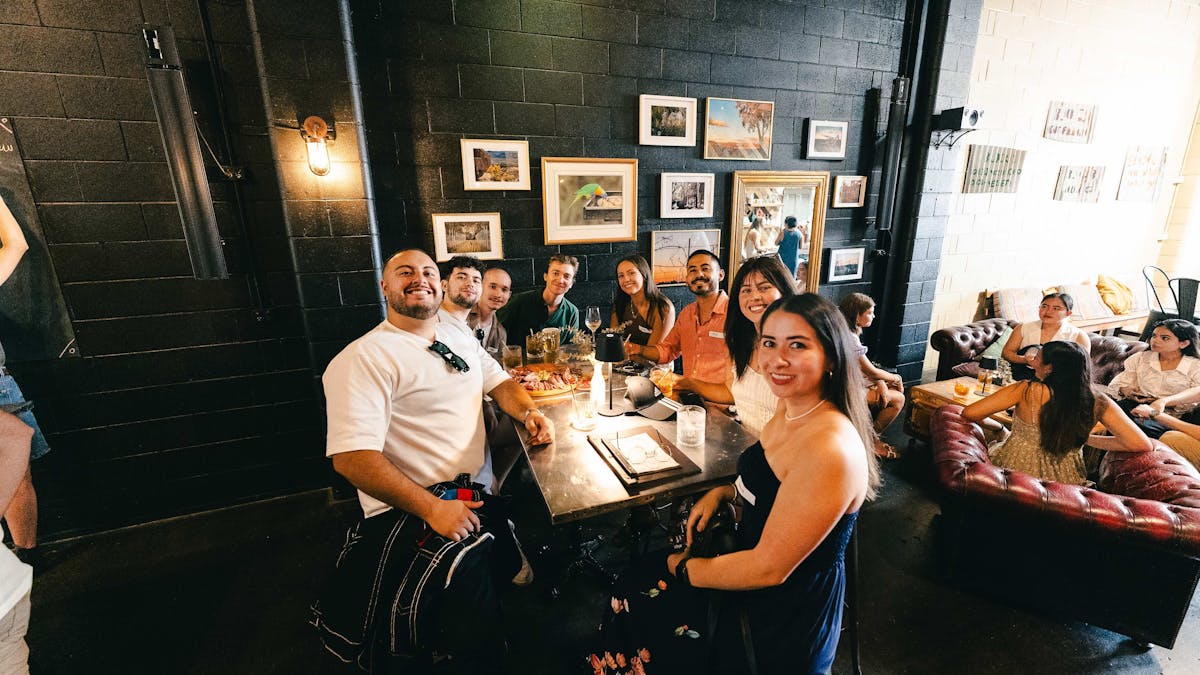 Friends enjoying a drink together at the distillery