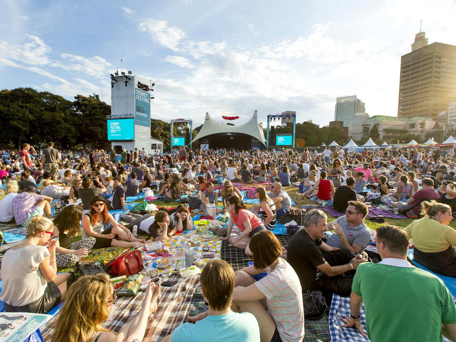 Crowds enjoying a concert at the Domain