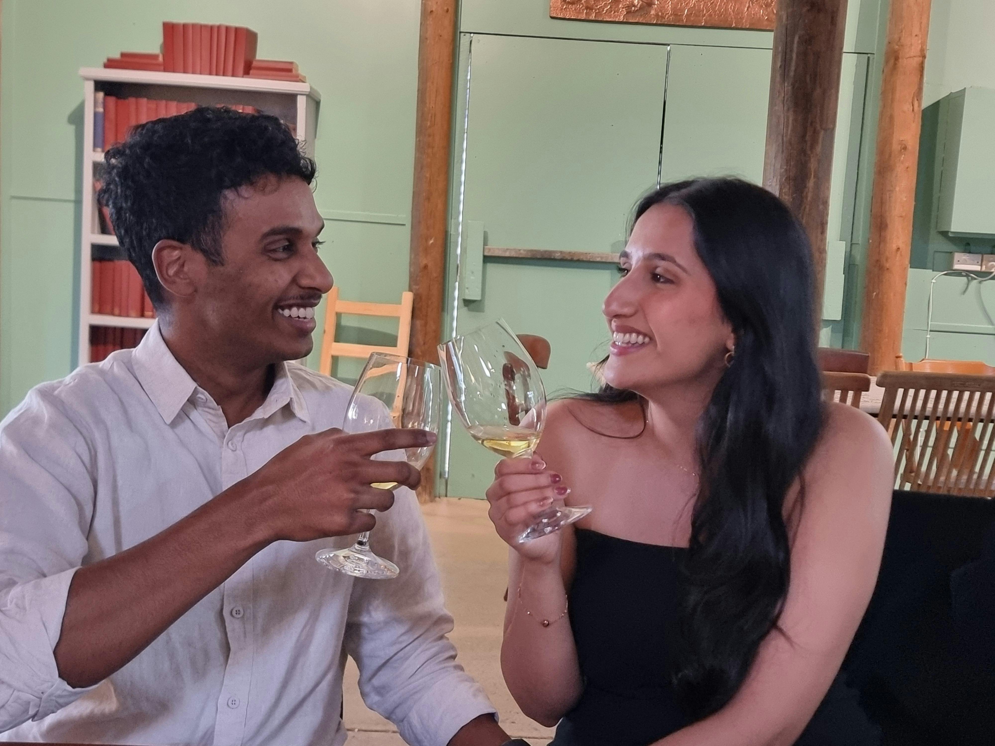 couple sampling wines