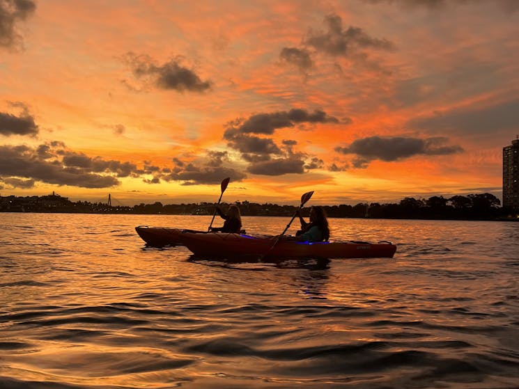 a double kayak in the spectacular sunset