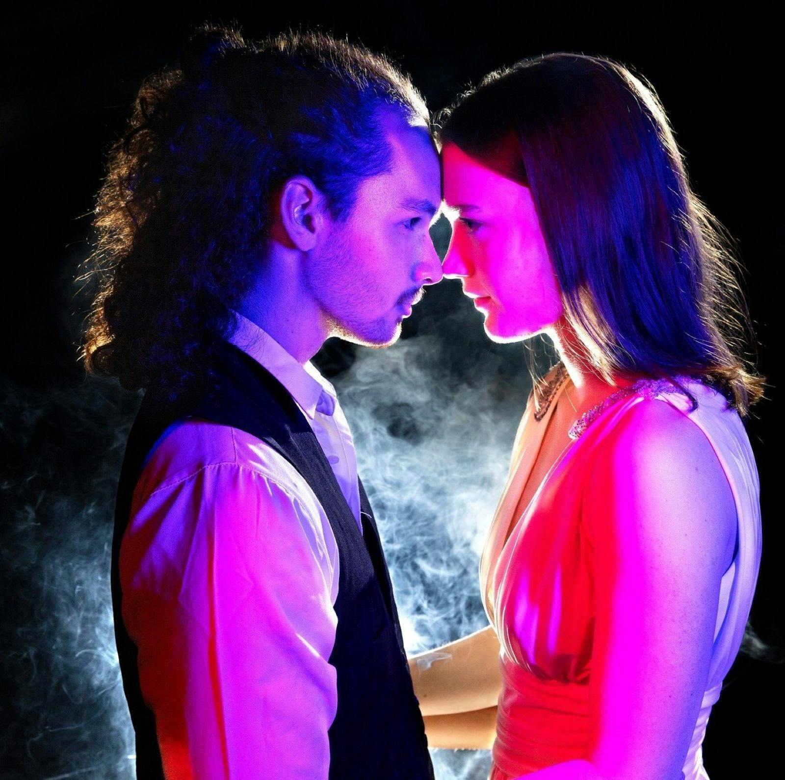 Roo Theatre - a lady and a young man acting as  Romeo & Juliet, looking into each others eyes.