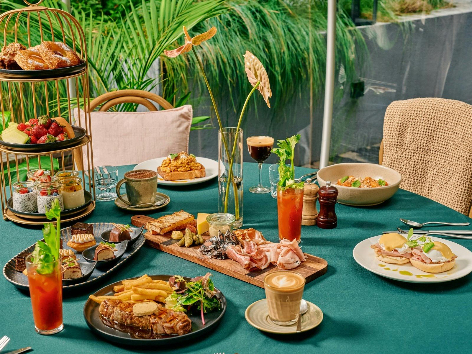brunch setting on table inside private conservatory