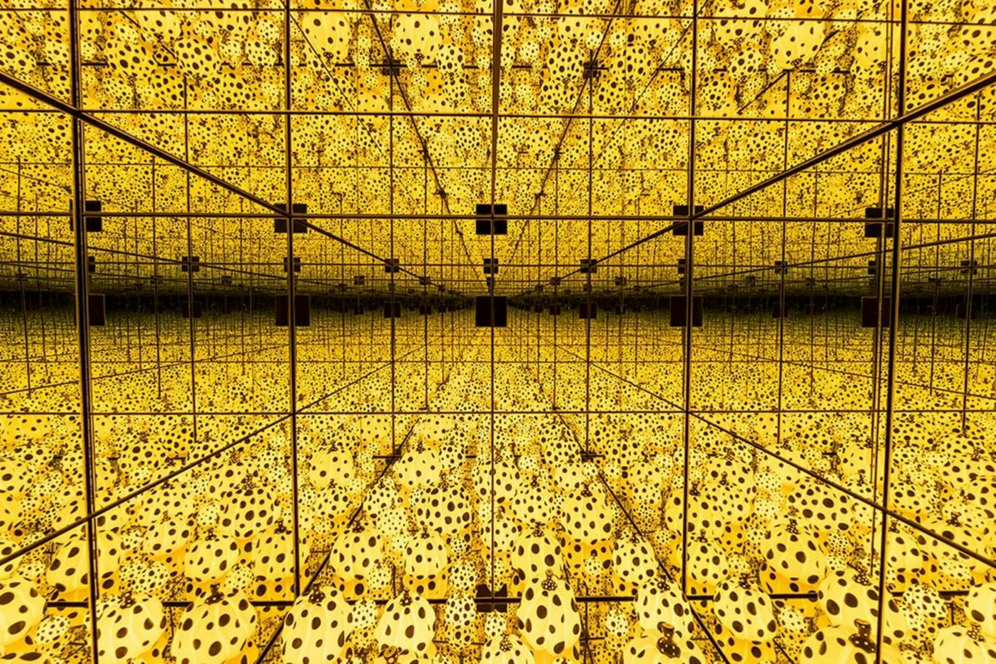 A crop of pumpkins are reflected into infinity by a set of internal mirrors in