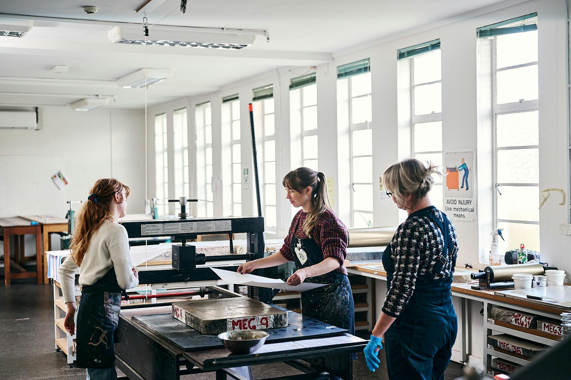 Two Megalo printers working with local artist Naomi Zouwer to produce a lithograph