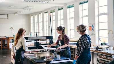 Two Megalo printers working with local artist Naomi Zouwer to produce a lithograph