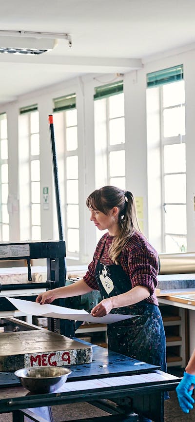 Two Megalo printers working with local artist Naomi Zouwer to produce a lithograph