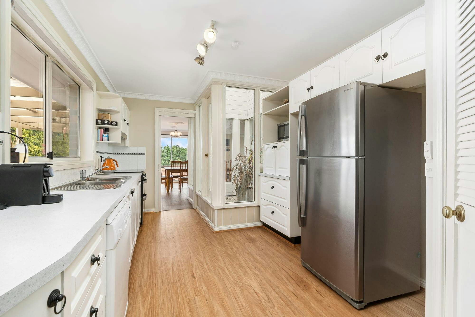 Large open kitchen with appliances and amenities