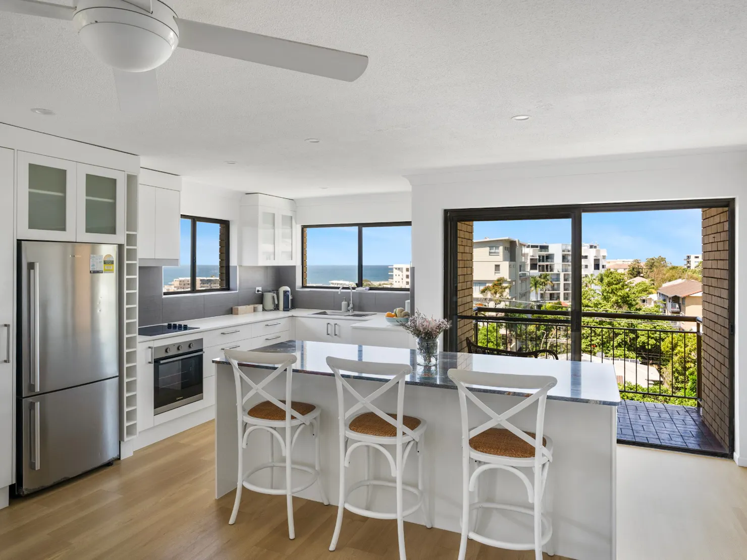 Fully equipped kitchen with island bench