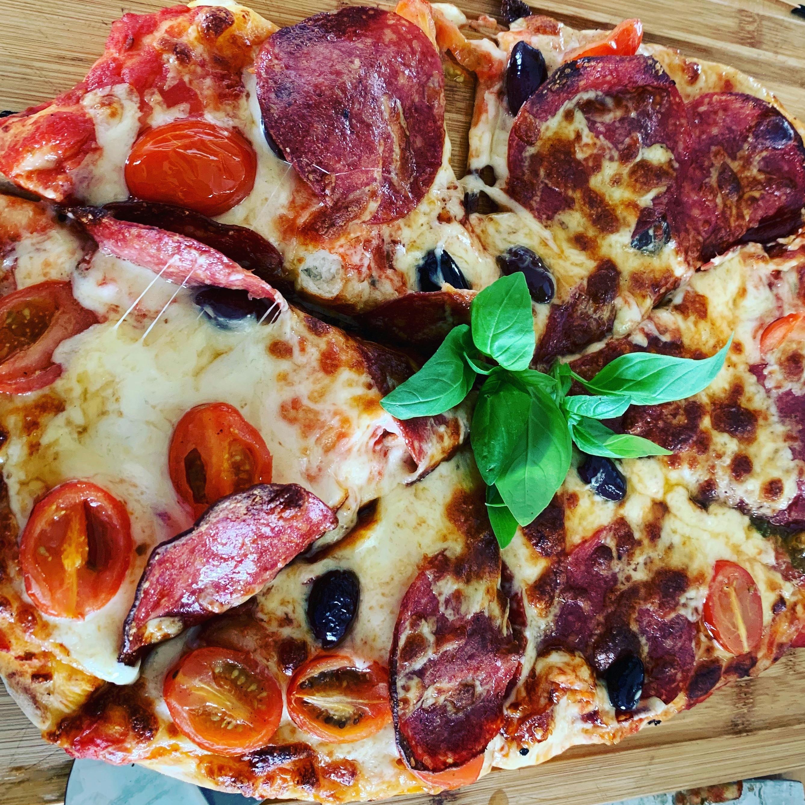 Delicious Half n' Half Pizza made with our in-house dough. We cater to many dietary requirements. <3