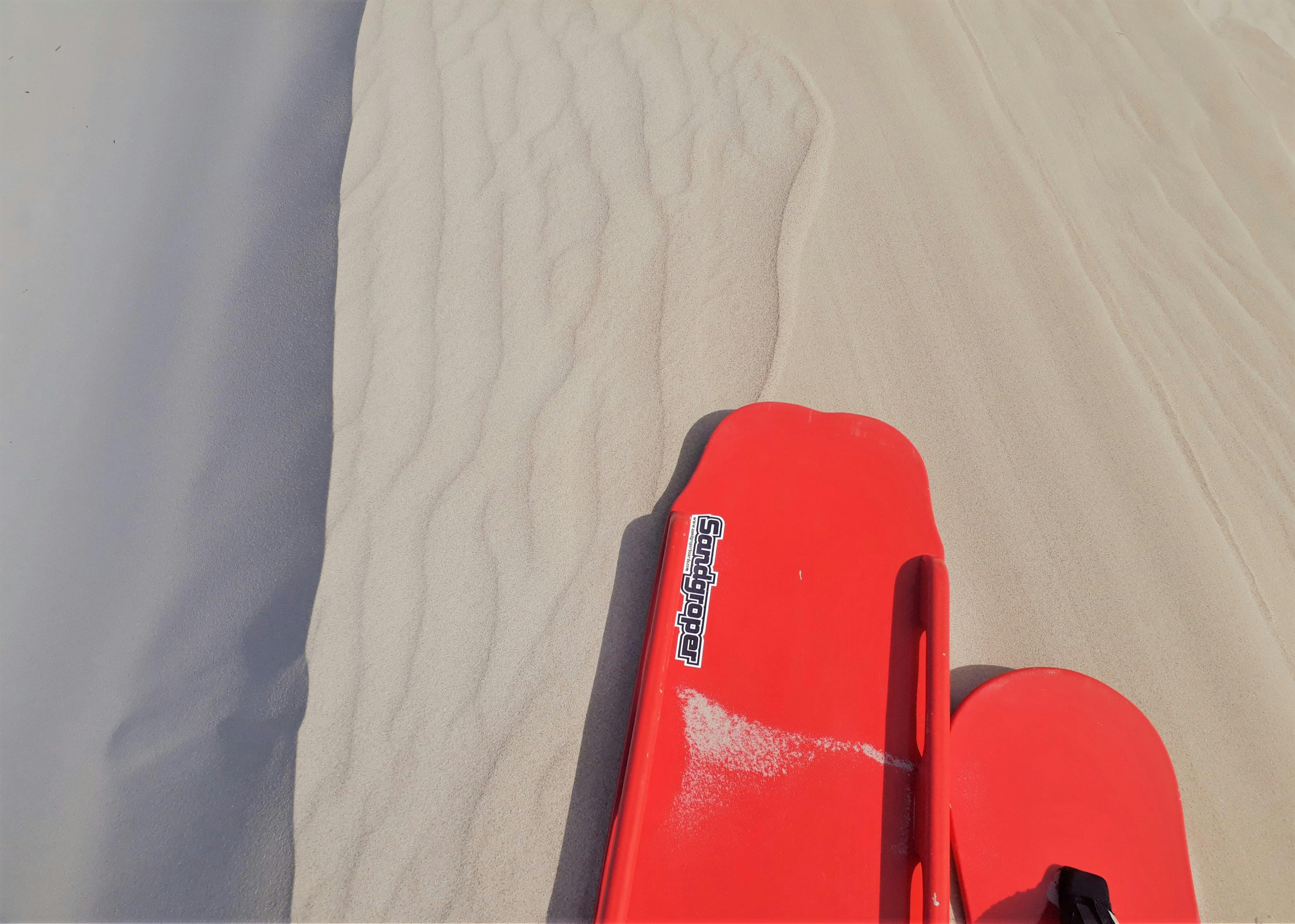 Red boards on dune