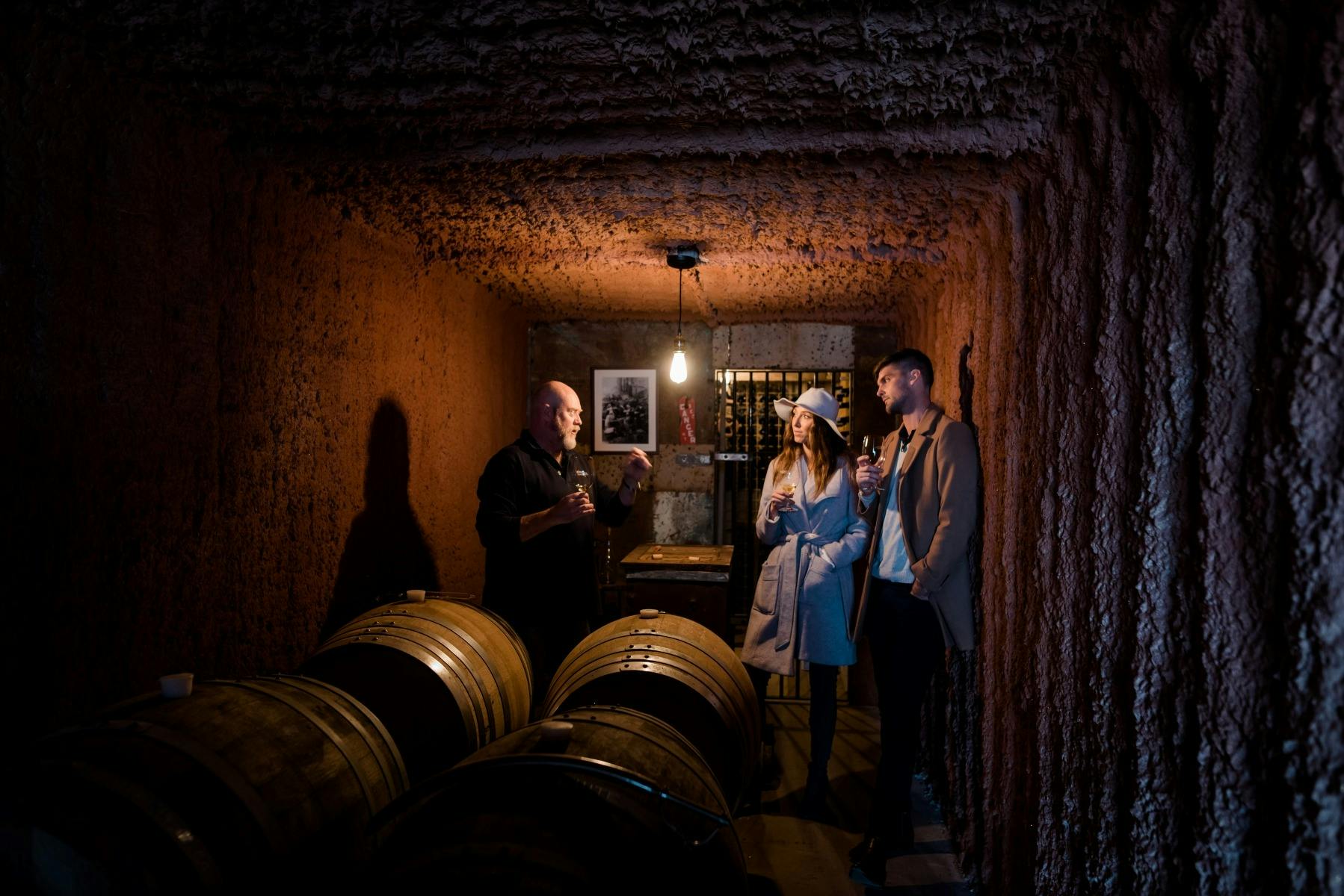 Vinny and some people barrel tasting the Shiraz