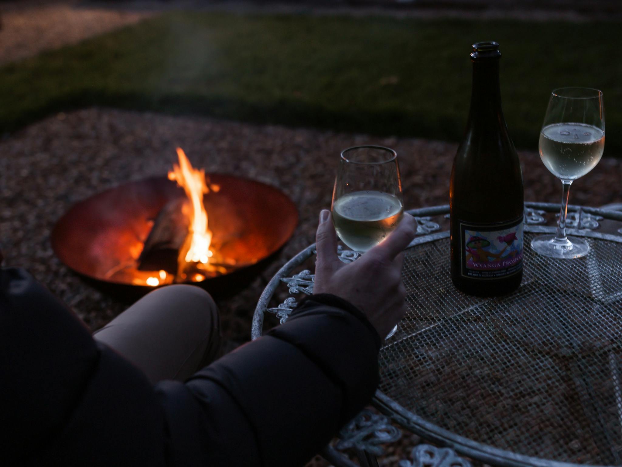 Outdoor firepit and furniture provided with sunset views