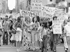 Women protesting during the 1970s in Melbourne. One of the signs reads 'dress for comfort no style'.