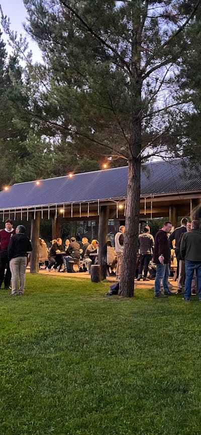 Large catered function in the viewing park, guests celebrating a corporate party with drinks and BBQ