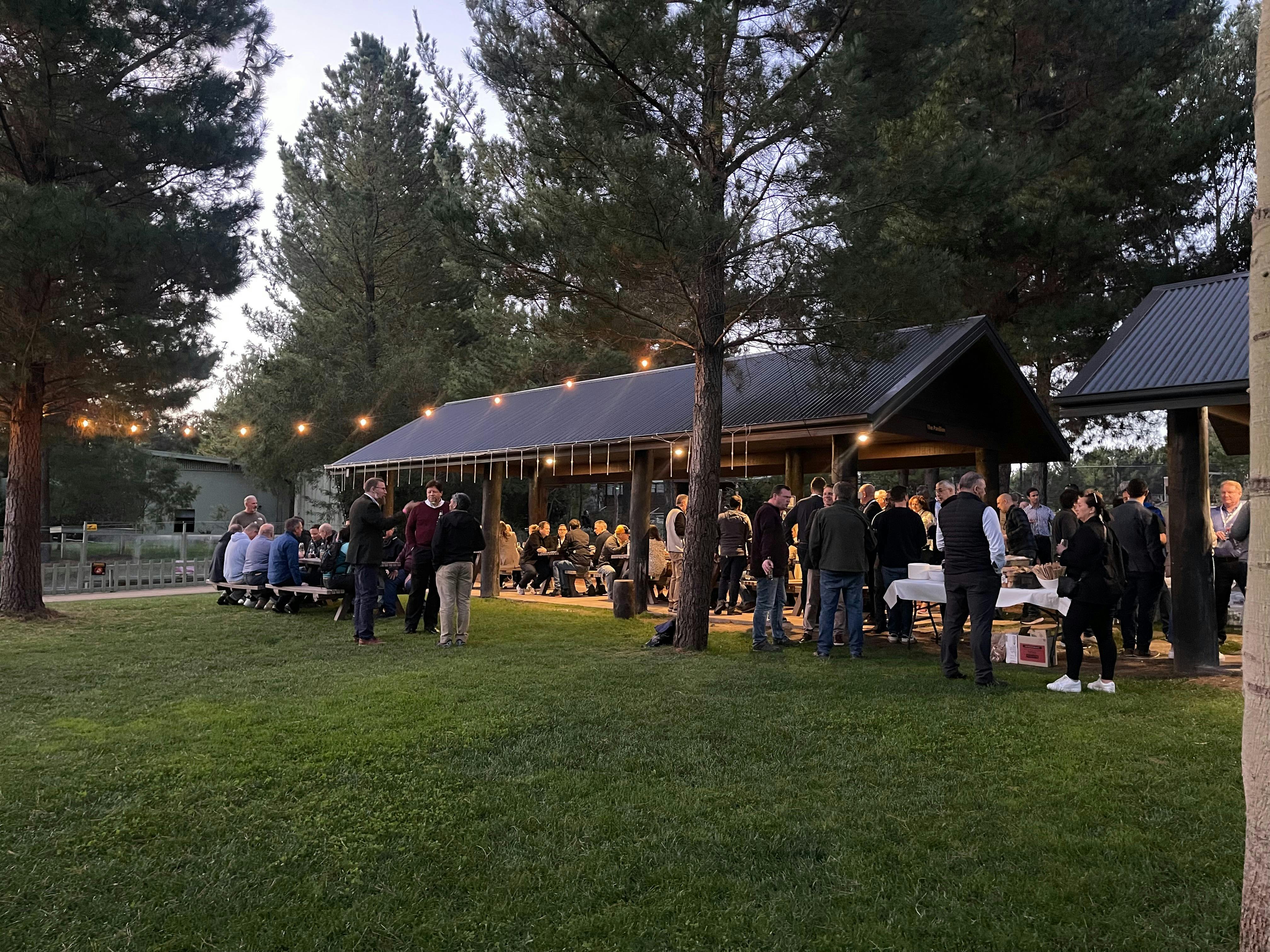 Large catered function in the viewing park, guests celebrating a corporate party with drinks and BBQ