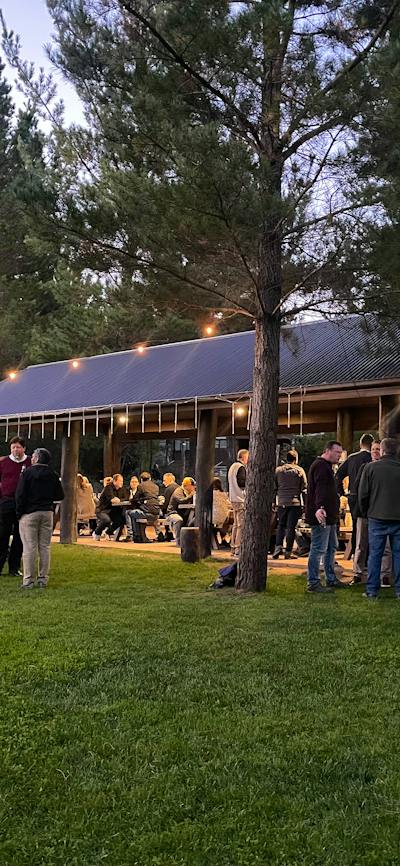 Large catered function in the viewing park, guests celebrating a corporate party with drinks and BBQ