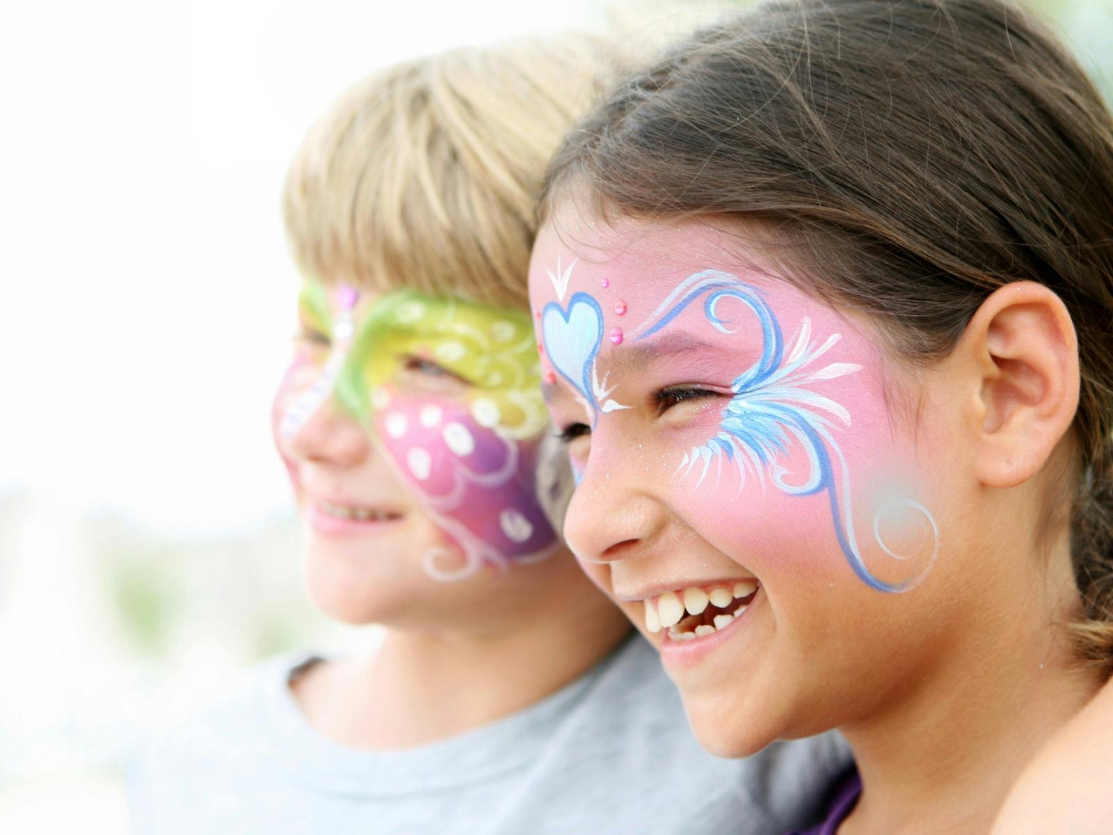 two kids with face painting