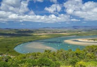 Views of the Endeavour River and lined greenery from Grassy Hill Lookout in Cooktown.