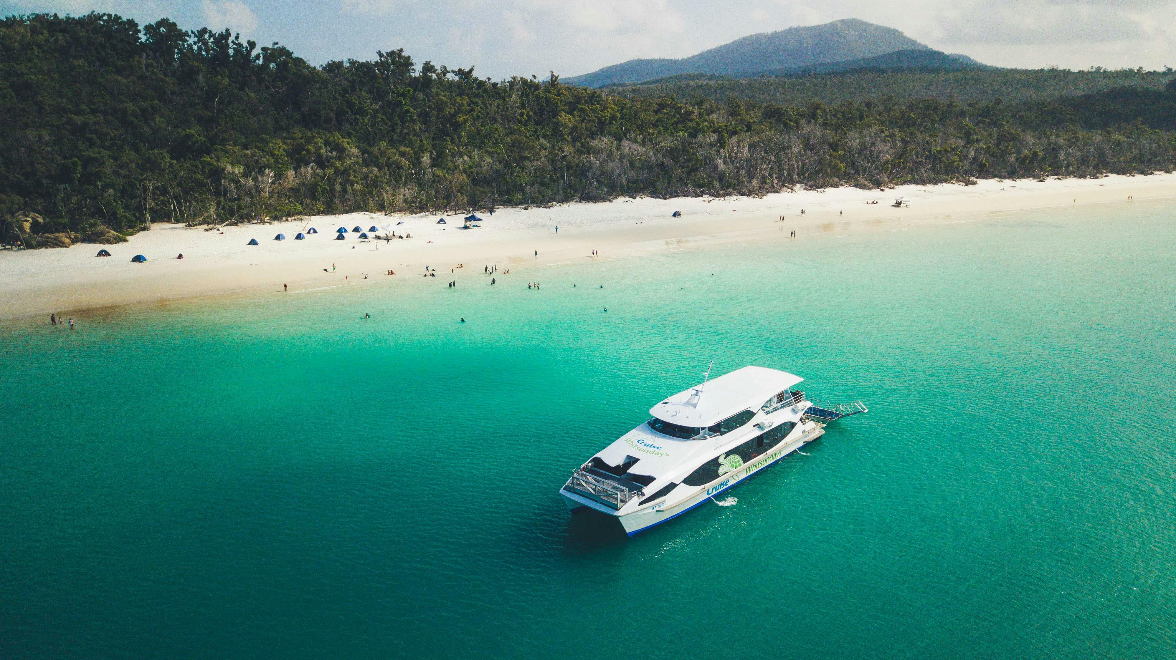 Cruise Whitsundays' vessel anchored at Whitehaven Beach