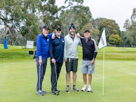 Golfers celebrating the Coonawarra Vignerons Cup after a memorable week of golf and touring.