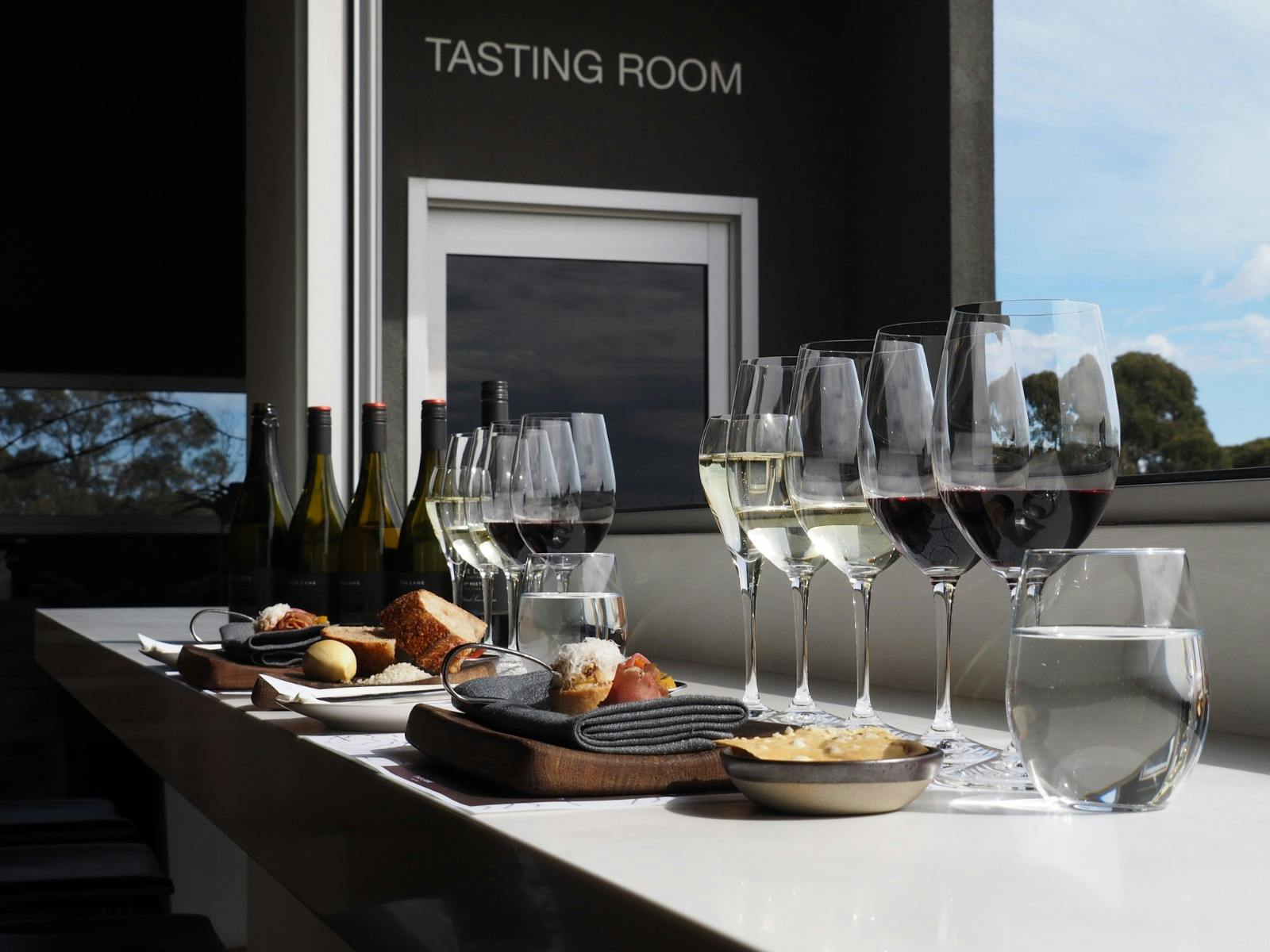 The Lane's wine tasting flight experience paired with light bites.