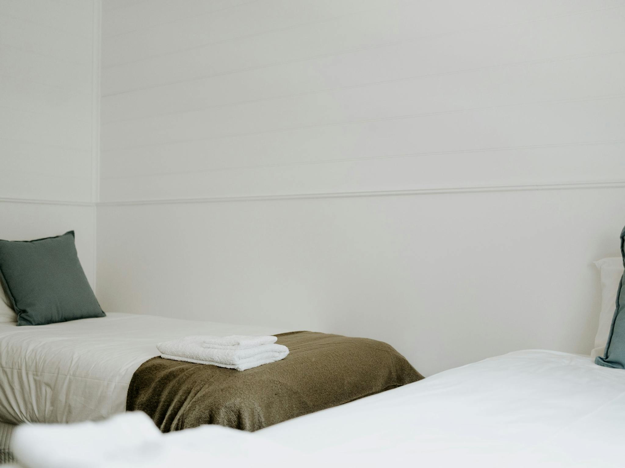 The single bedroom at The Cottage on Gray Wangaratta comprises two king single beds.