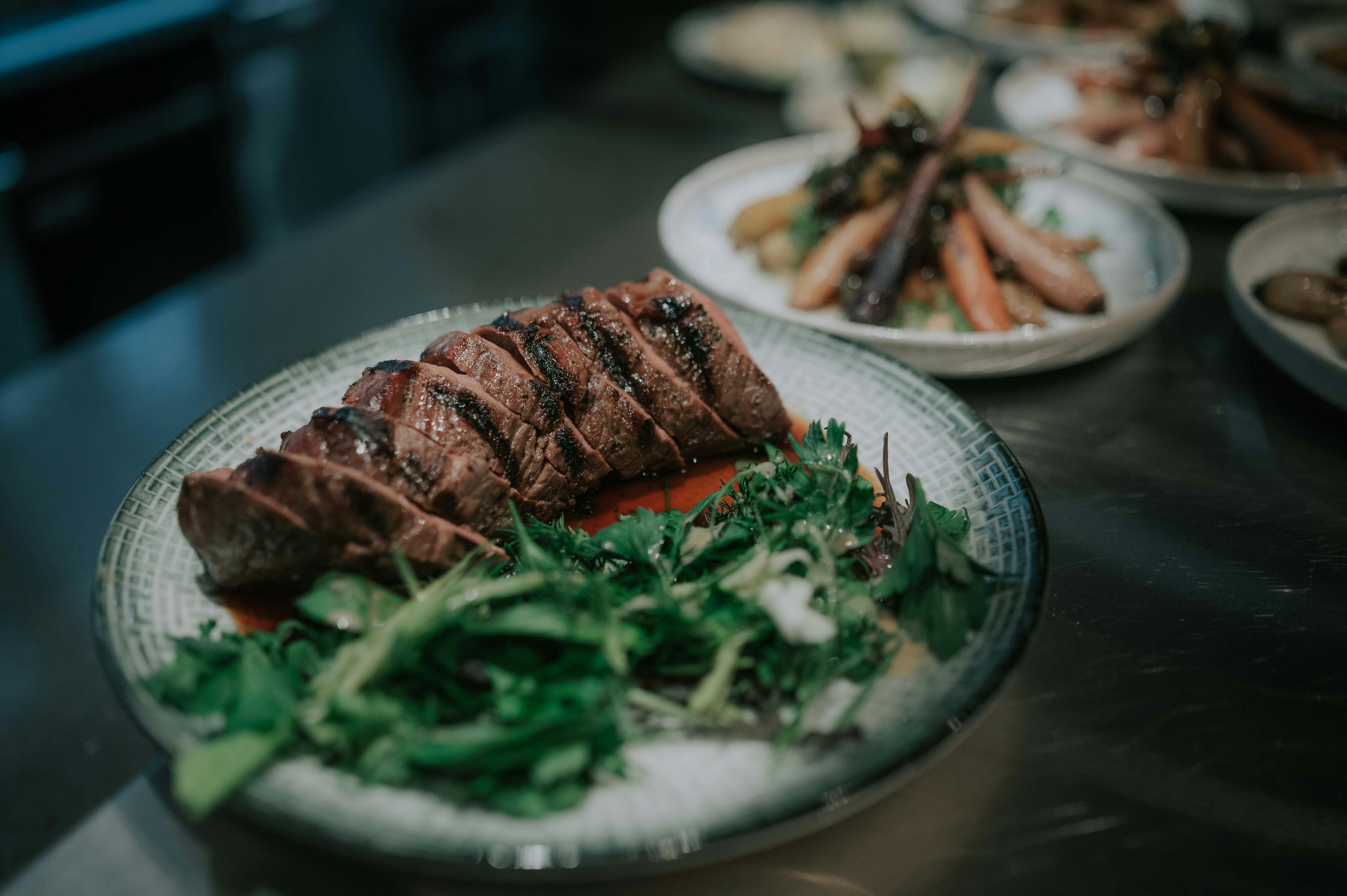 Sliced The Farmhouse Sirloin, red wine jus and herb salad
