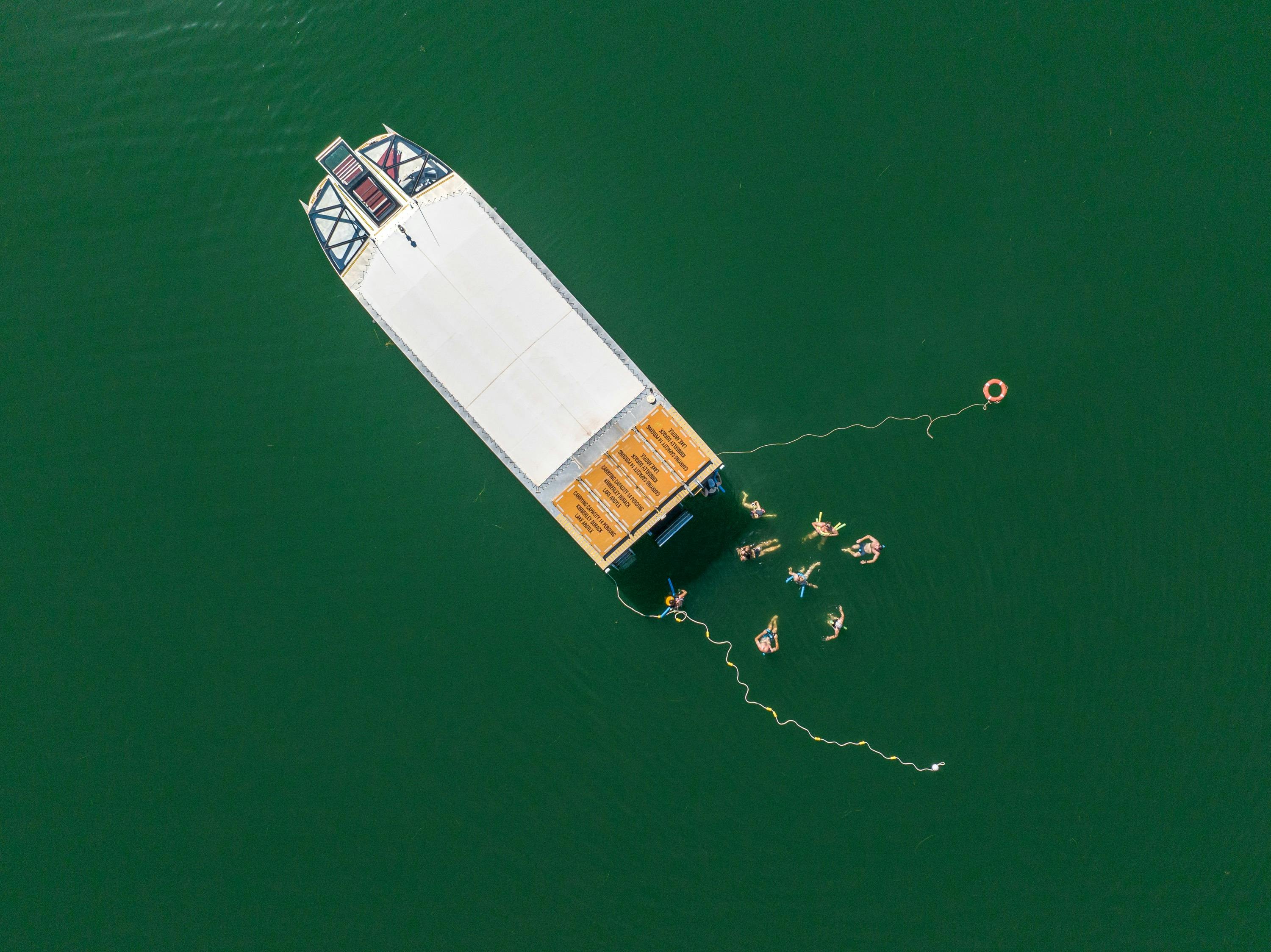 People swimming Lake Argyle