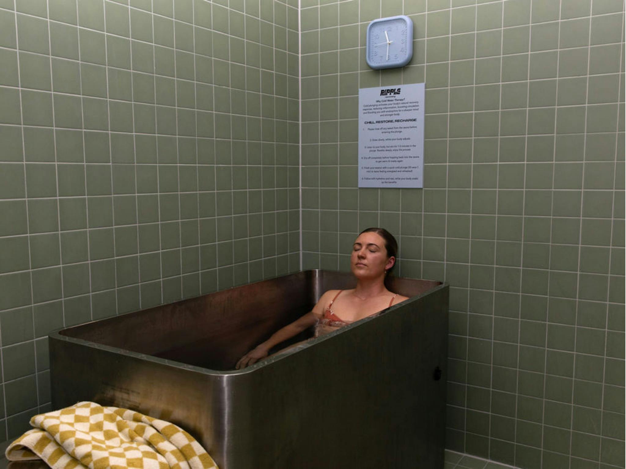 women relaxing in cold plunge