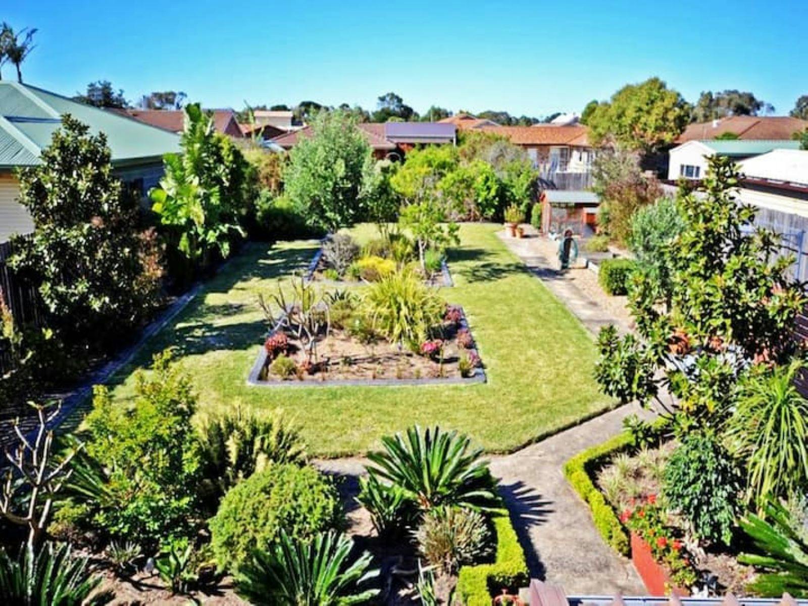 view of backyard from top balcony