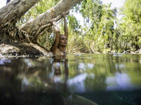 Woman swimming in Bitter Springs
