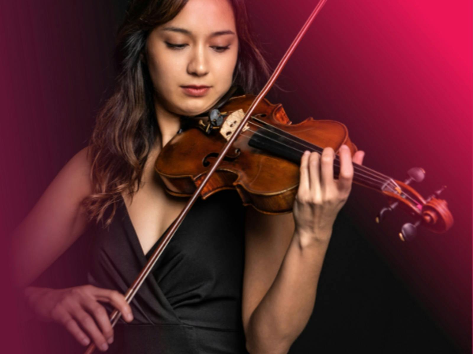A woman playing the violin.