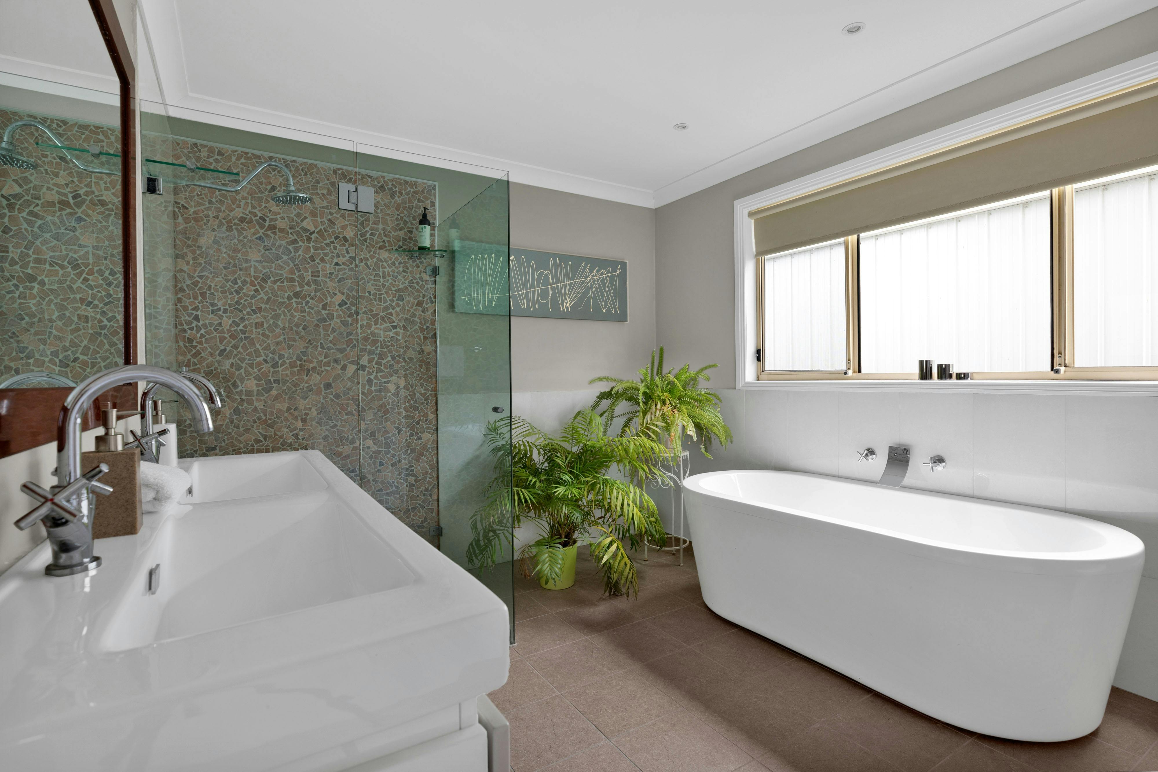 Bathroom with free standing bath and walk-in shower