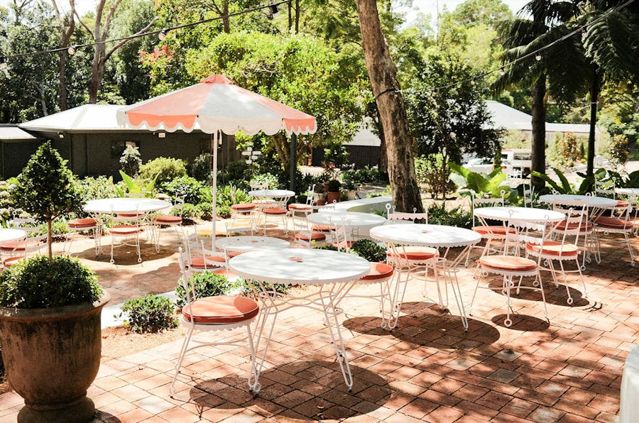 outdoor restaurant with umbrellas and tables