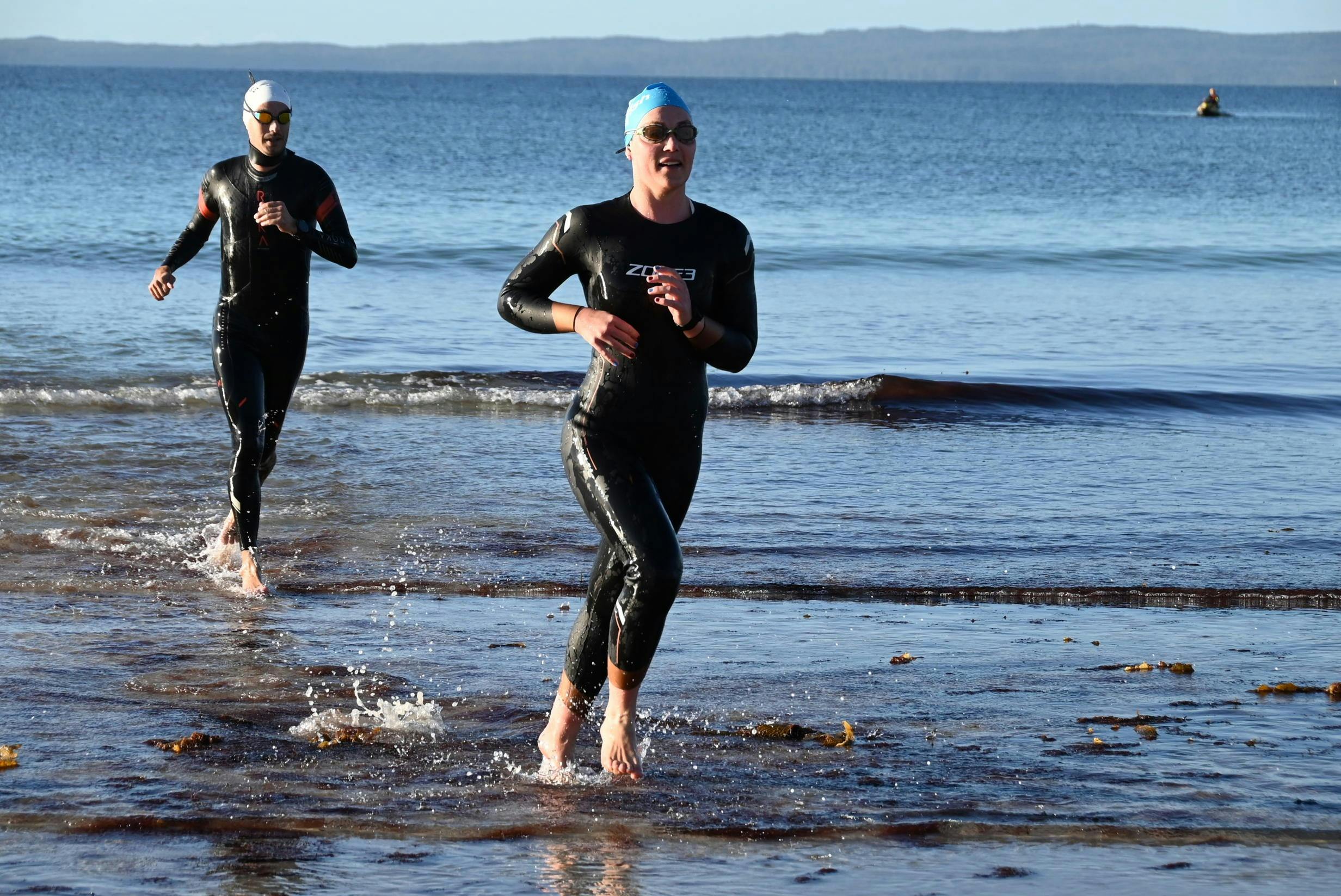 swimmers running out of water