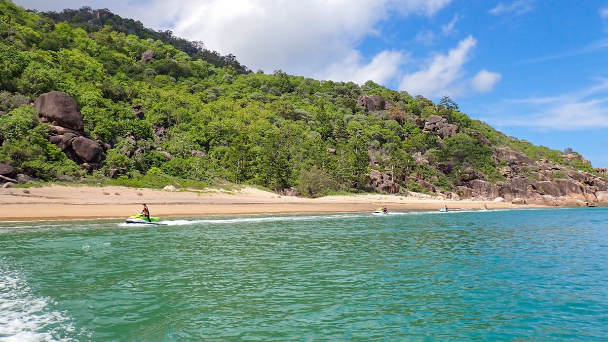 Enjoying the fastest access to Five Beach Bay on our 90-minute guided Jet Ski Adventure Tour
