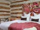 Character and comfort offered by four bedrooms; 3 kings and a queen bedroom with extra folding beds.