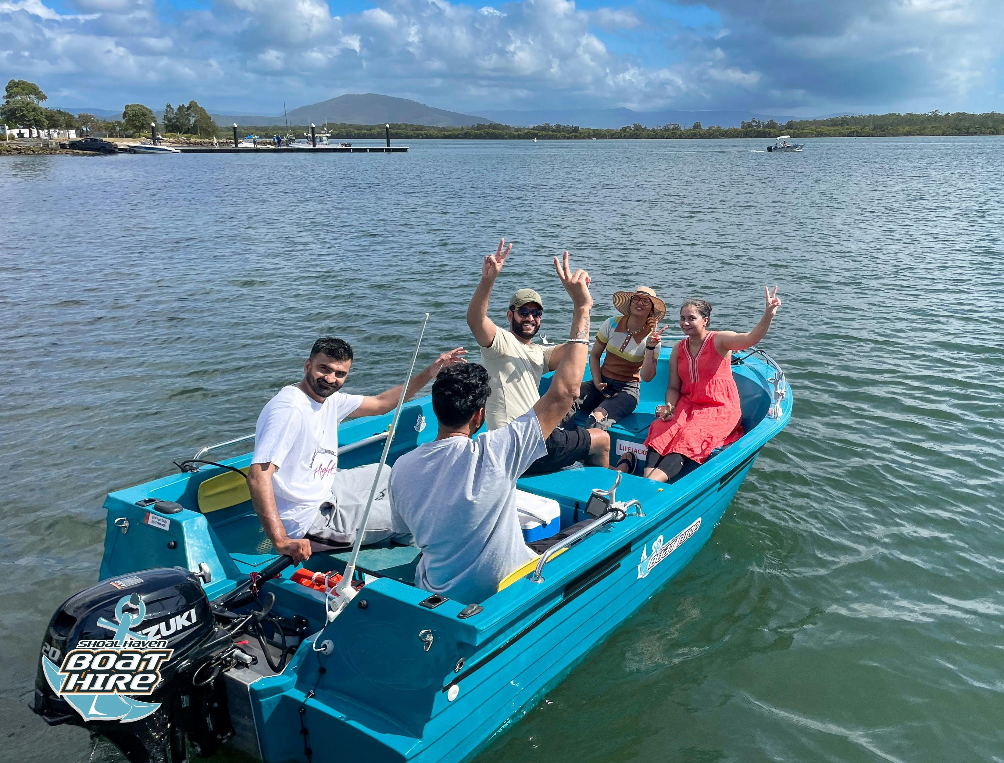 friends on boat exploring river.