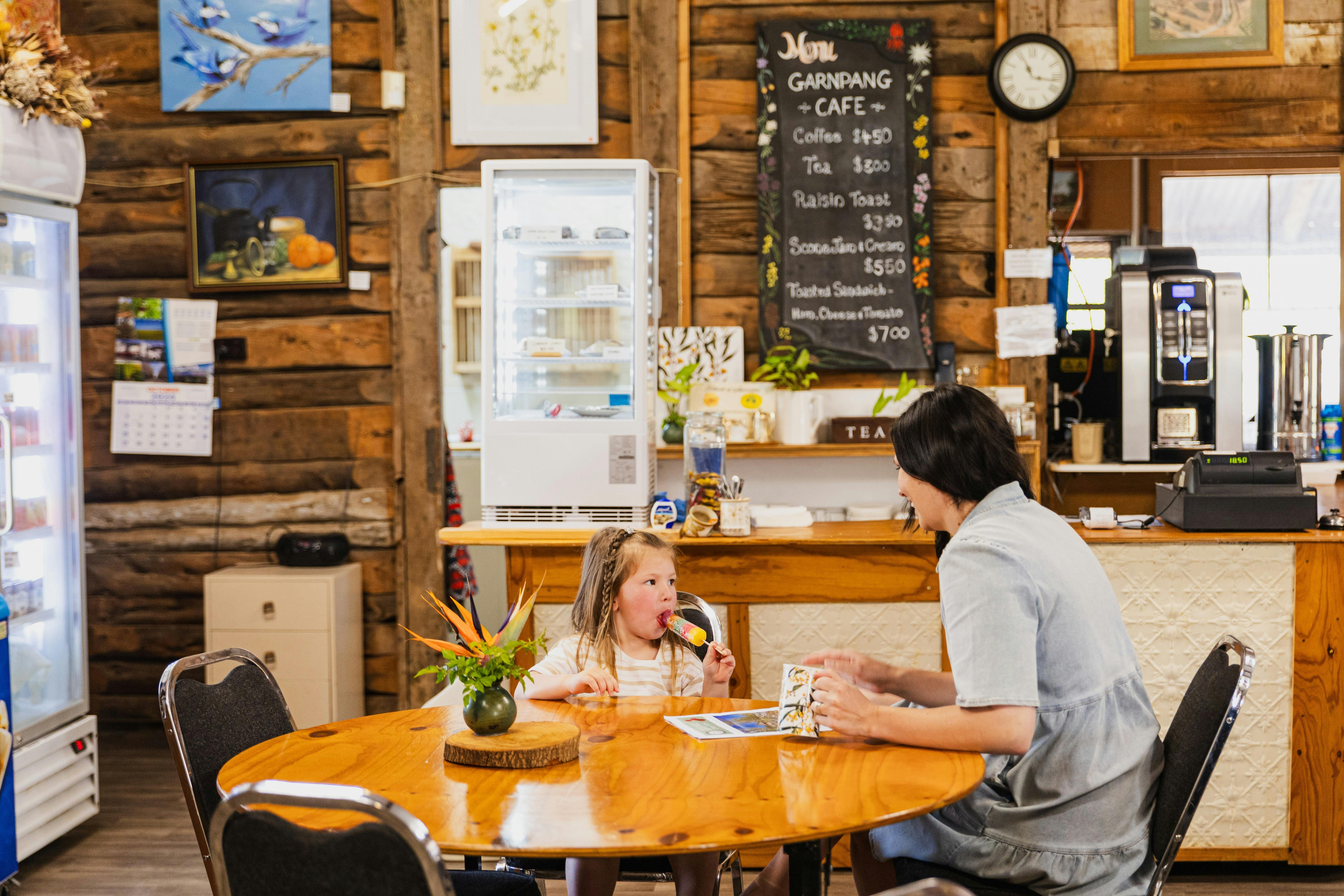 Mum and daughter having a snack