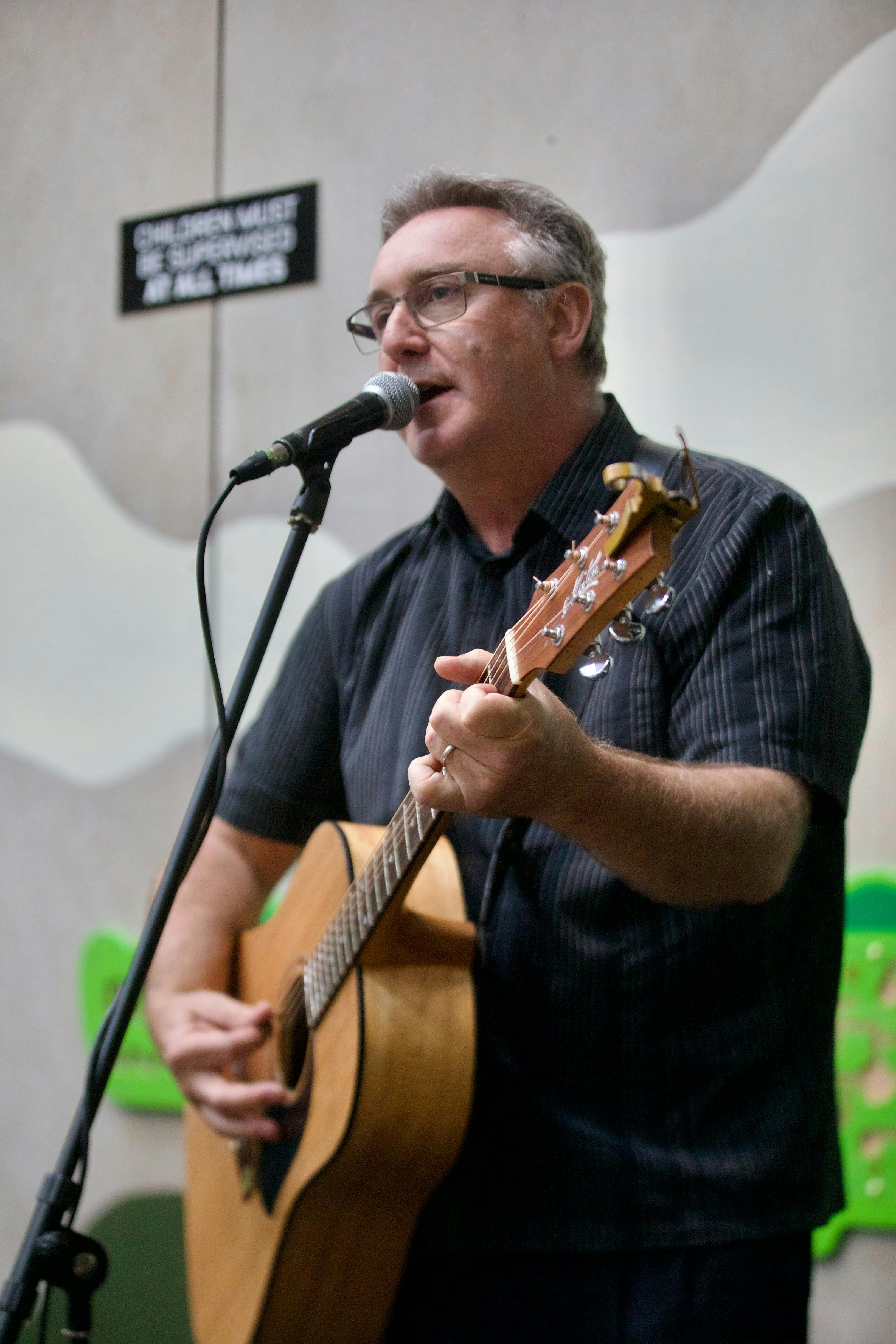 Male guitarist on stage