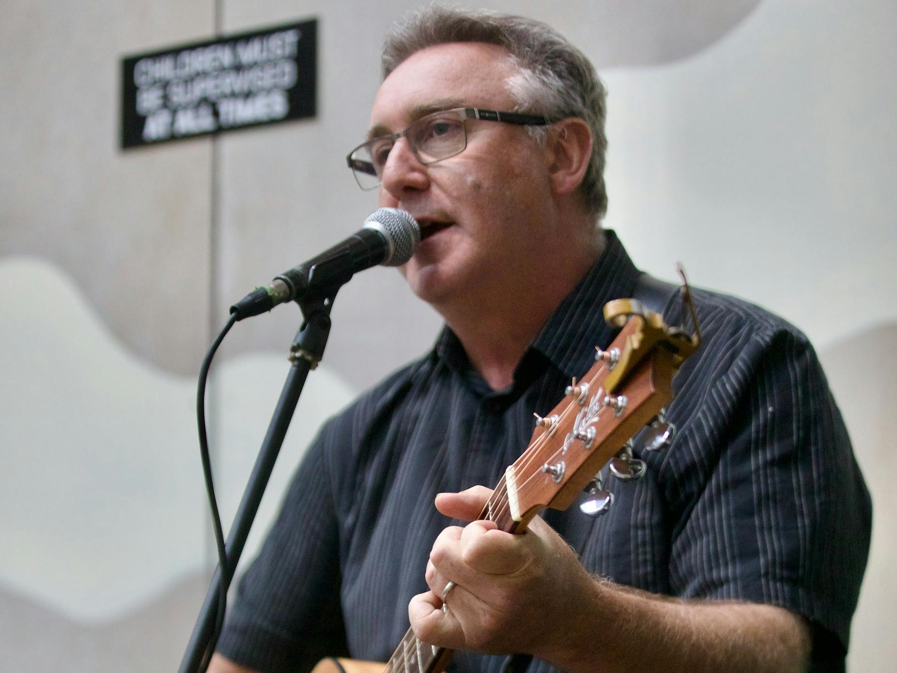 Male guitarist on stage